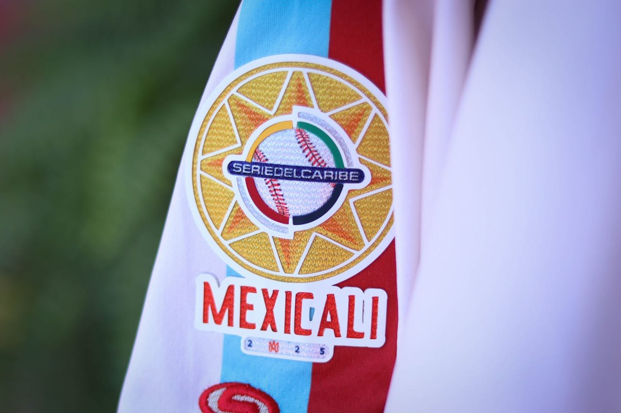 Close-up of Serie del Caribe Mexicali baseball patch on a white jacket sleeve.